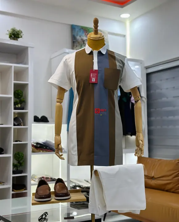Striped panel top with cream trousers